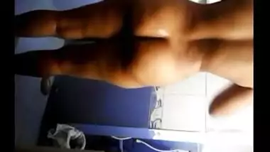 South Indian college girl playing with her pussy in bathroom