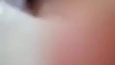 Desi MILF is lying in bed exposing her small XXX boobs and muff