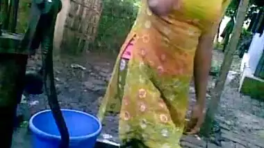 Bangla desi shameless village cousin-Nupur bathing outdoor