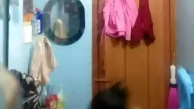 Indian whore closes the door and starts daily XXX striptease home