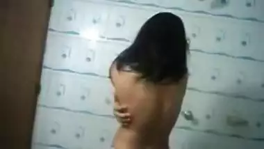 Horny teen enjoying hugging herself