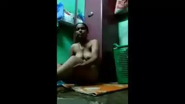 Desi bhabhi masturbating opening her legs in kitchen