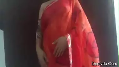 Hot sexy desi wife simran bhabhi showing boobs and ass in red saree