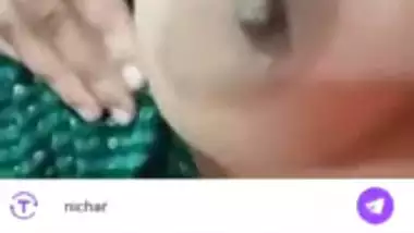 Stripchat girl Trisha playing with naked boobs