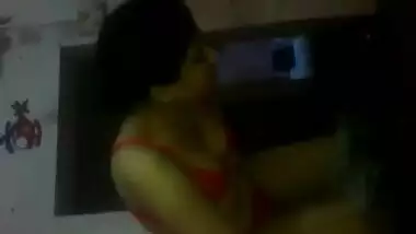 Girl striping her jeans n top