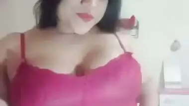 Big boob nude girl shows her butt and squeezes her boobs