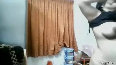 Paunchy housewife of Indian origin walks naked in front of camera